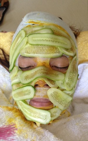 College Alaska woman covered with cucumber facial
